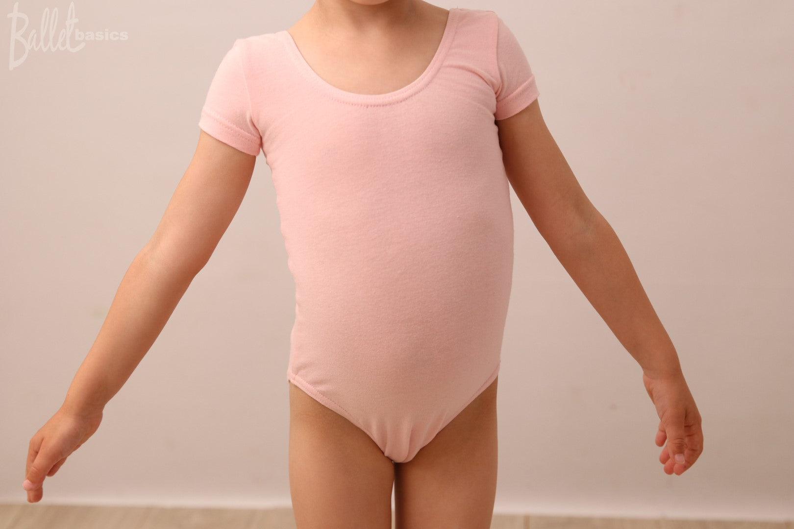 Cap sleeve leotard in cotton lycra - pink front view