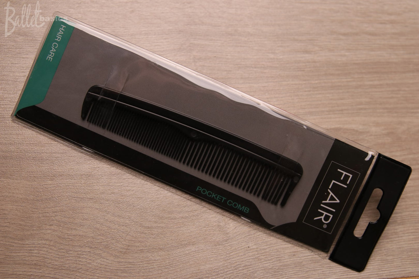 Short black pocket comb